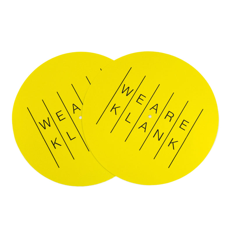 Pair of yellow slipmats with black We Are Klank lettering